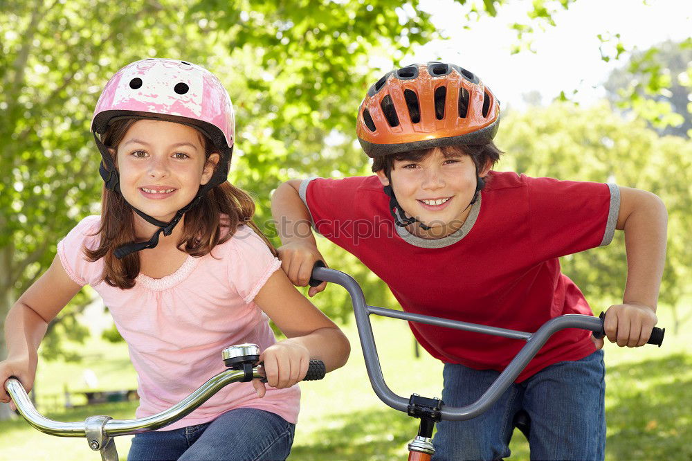 Similar – father and daughter fixing problems with bicycle outdoor