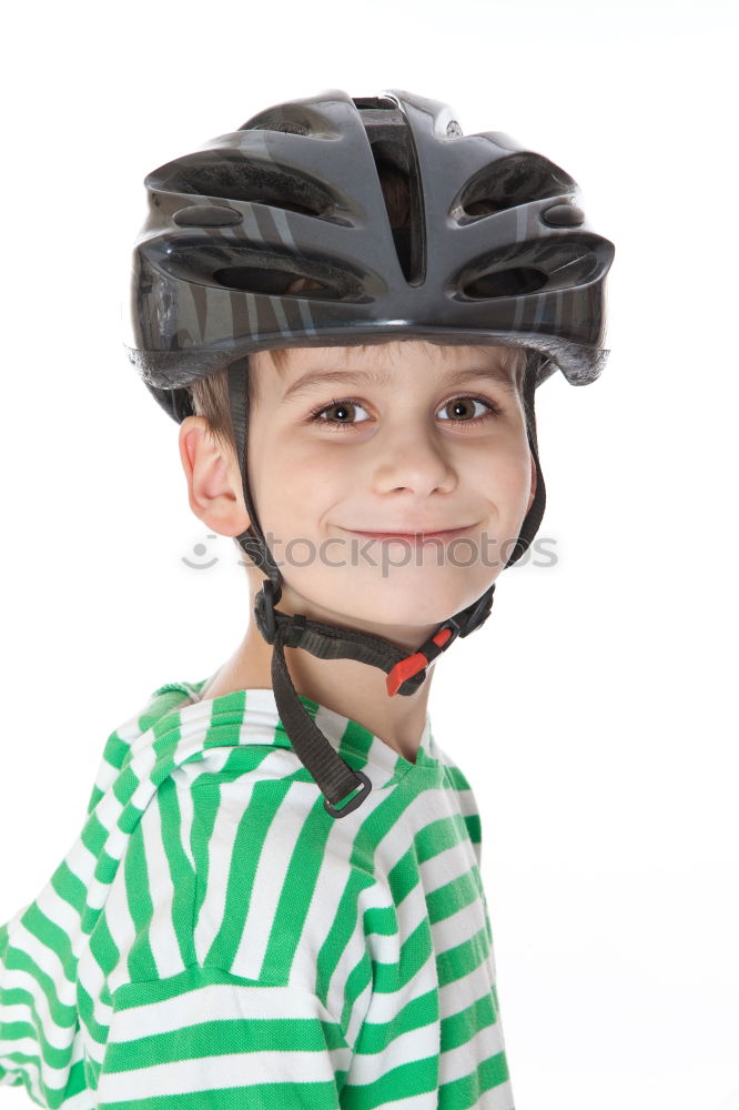 Similar – Cool gap | Portrait of a boy with a bicycle helmet and a tooth gap