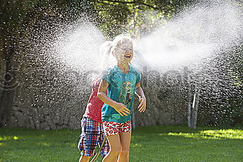 Similar – adorable boy watering the plants