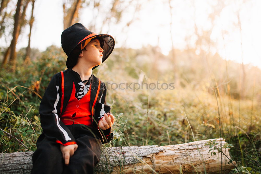 Similar – Image, Stock Photo boy exploring the outdoors with binoculars