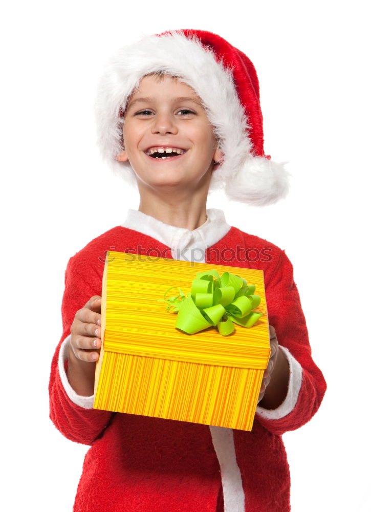 Similar – Adorable kid with Santa´s hat on Christmas day.