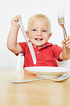 Similar – Image, Stock Photo A cute little girl in chef’s hat sitting on the kitchen floor soiled with flour, playing with food, making a mess and having fun