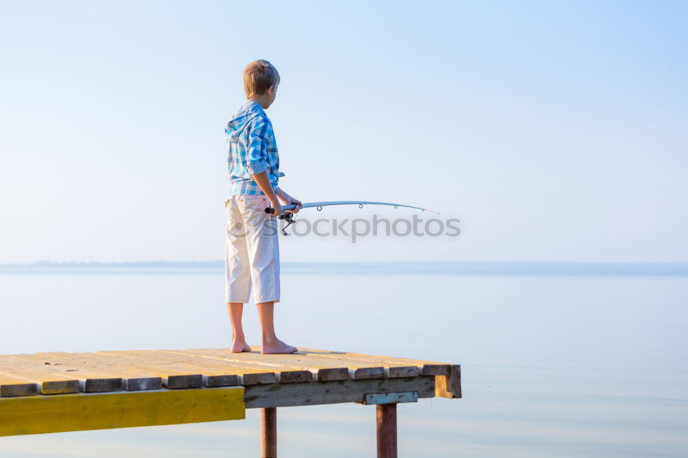 Similar – Image, Stock Photo Man on fishing with rod