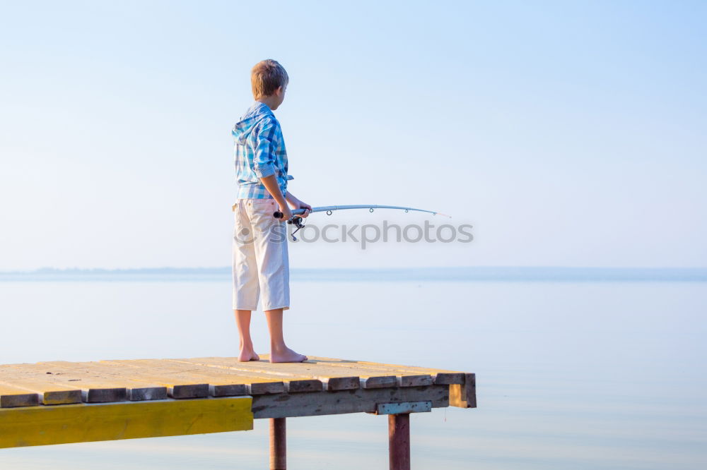 Similar – Image, Stock Photo Man on fishing with rod