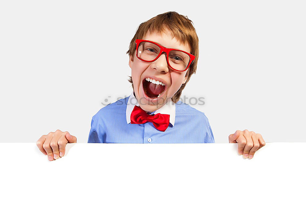 Similar – Image, Stock Photo funny child with colored pencil in the mouth against brick background