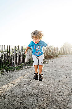 Similar – Image, Stock Photo Young girl with brown hair is playing outside.