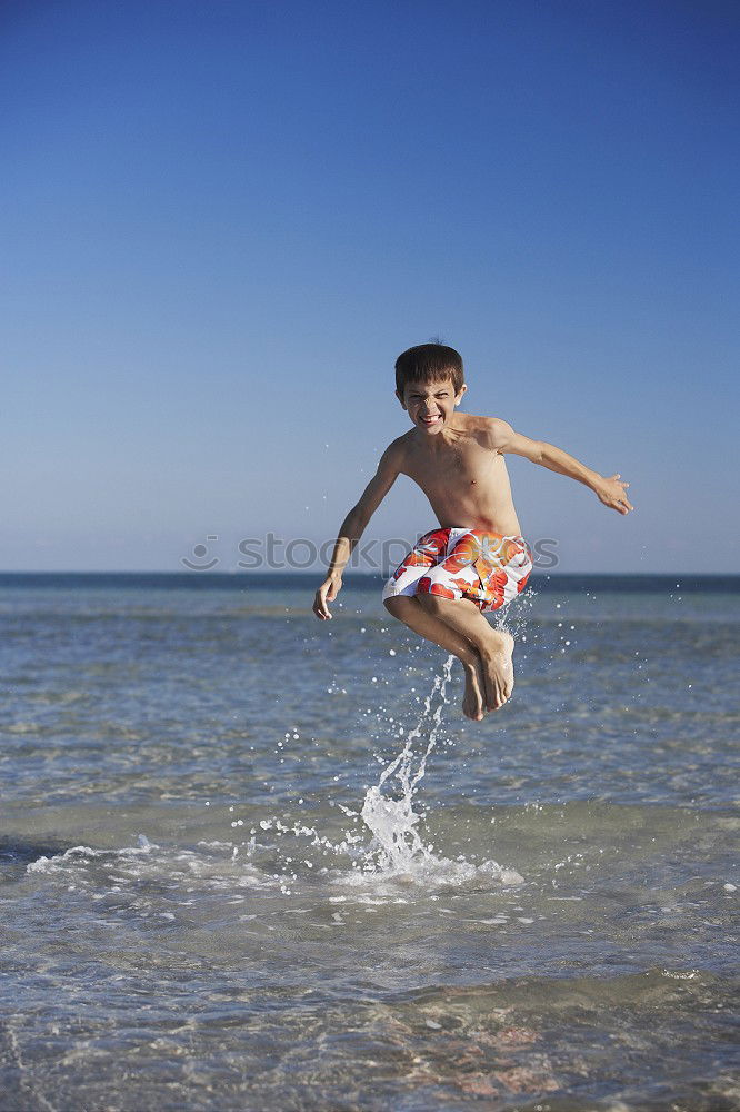 Similar – One little happy boy playing on the inflatable circle in swimming pool at the day time. Concept of friendly family.