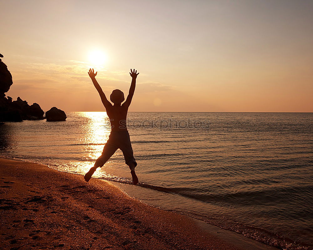 Similar – Happy children playing on the beach at the sunset time. Two Kids having fun outdoors. Concept of summer vacation and friendly family.