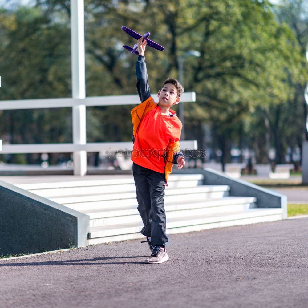 Similar – Image, Stock Photo child plays soccer with a ball