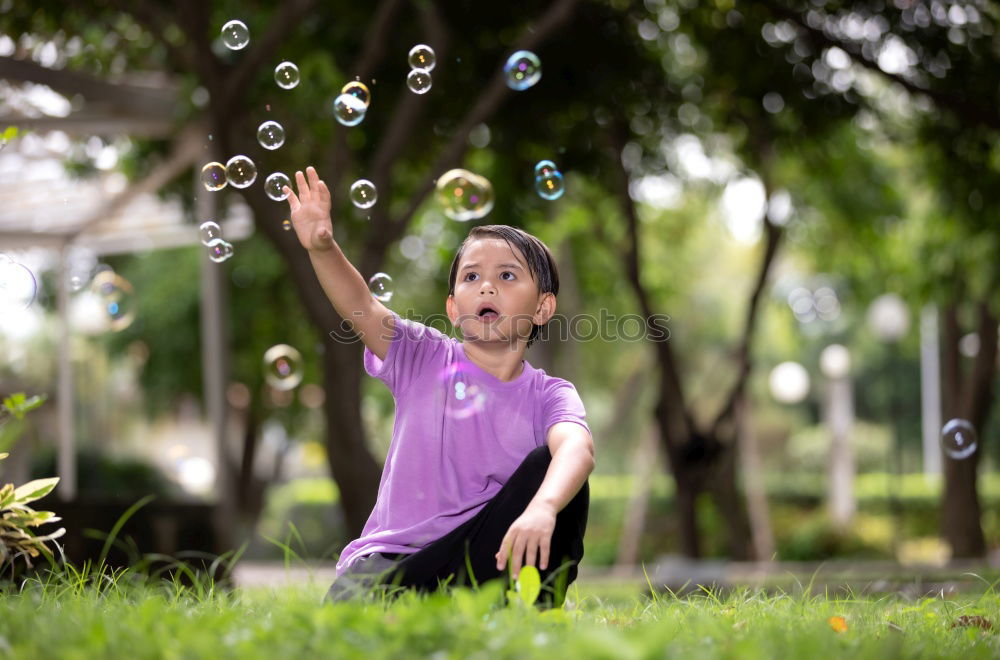 Similar – Image, Stock Photo Girl blowing balloon outside