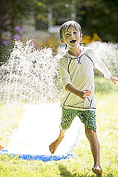 Similar – Sprinkler Fun Summer Water