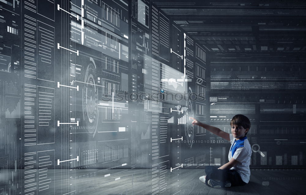 Image, Stock Photo Little boy sitting in his seat during a flight playing contentedly with a tablet computer in an airplane watched by his mother