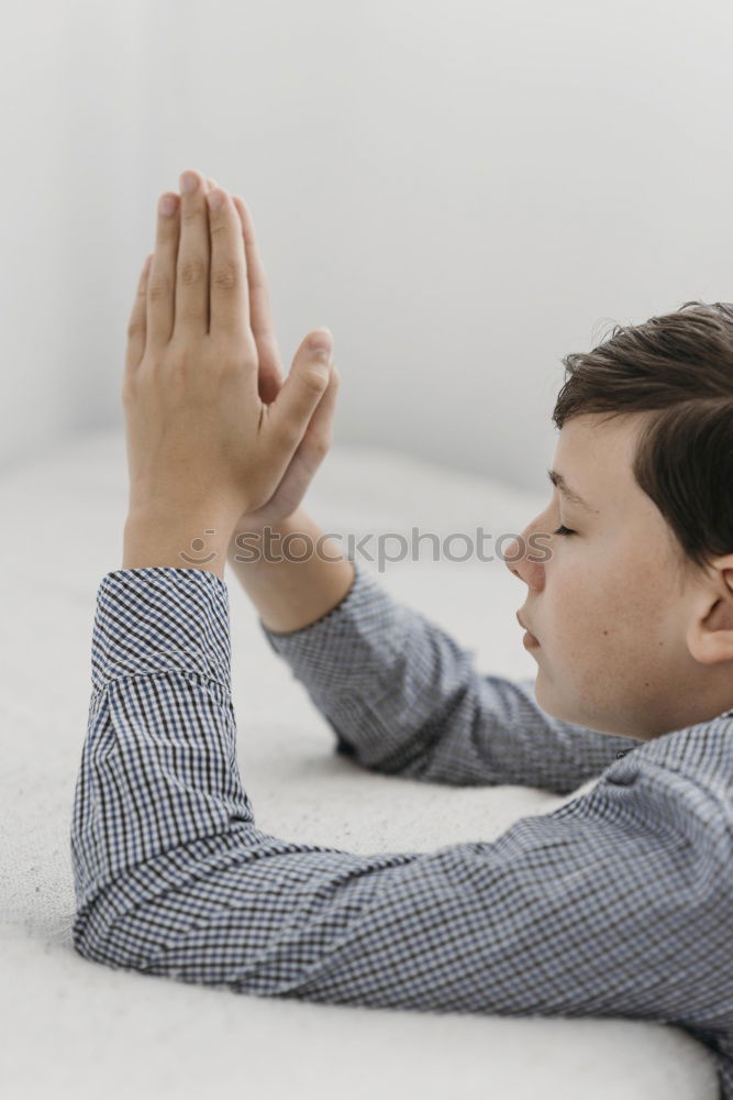 Similar – Image, Stock Photo Portrait of a young sad boy. Concept of lonely.