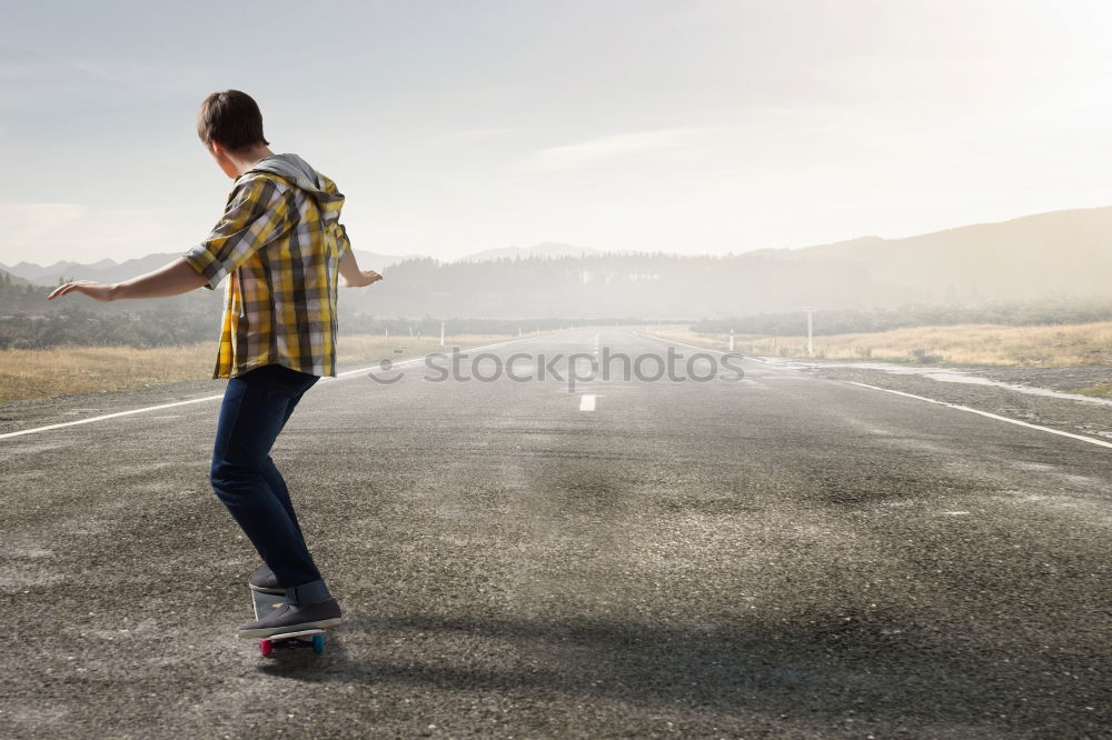 Similar – Man walking on road