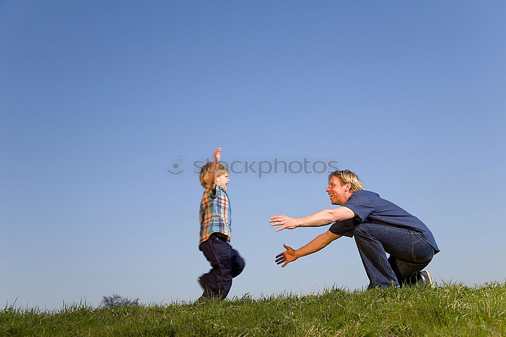 Similar – Image, Stock Photo Father and son playing with cardboard toy airplane