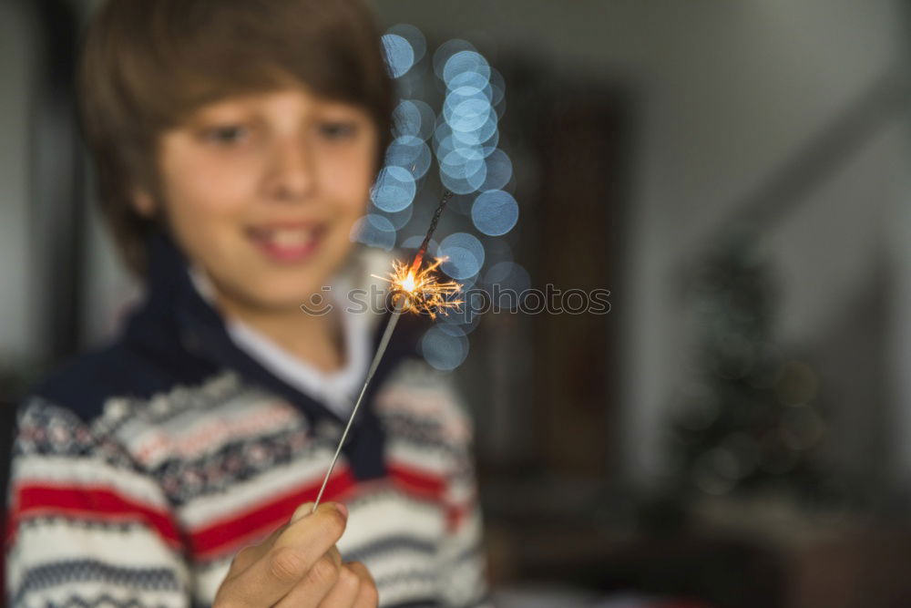 Similar – Image, Stock Photo Cute boy shows a leaf in autumn in the forest