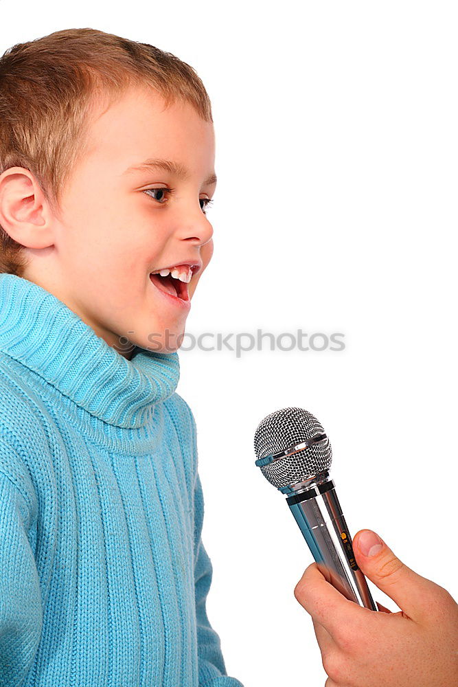 Similar – Boy singing to microphone