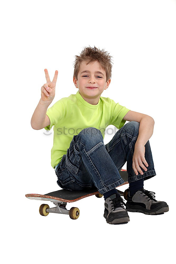 Similar – Image, Stock Photo A smiling boy with skateboard sitting alone on the floor