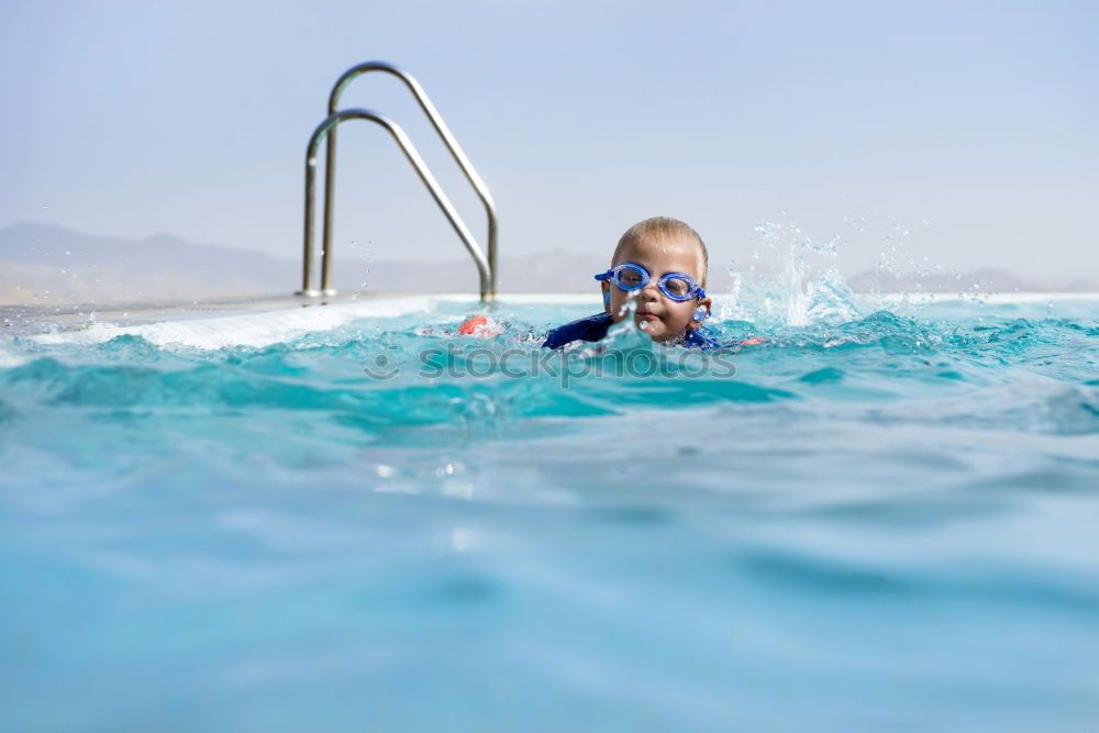 Similar – Submerged Human being