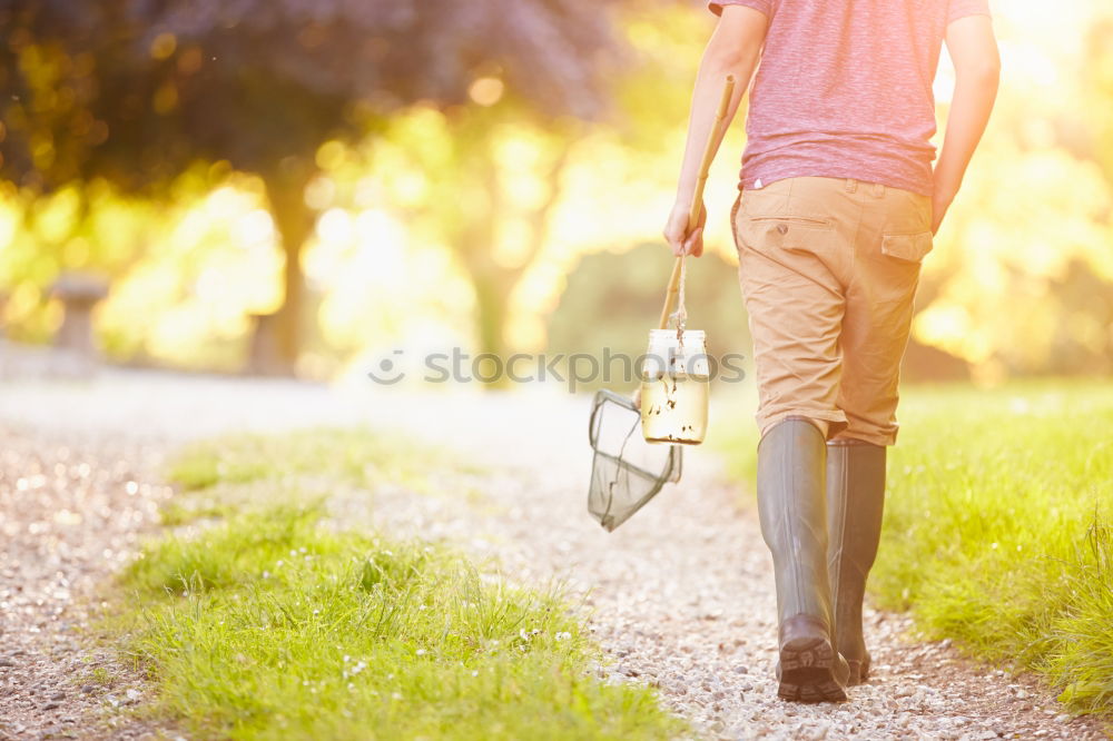 Similar – Close up of a photographer with her camera.