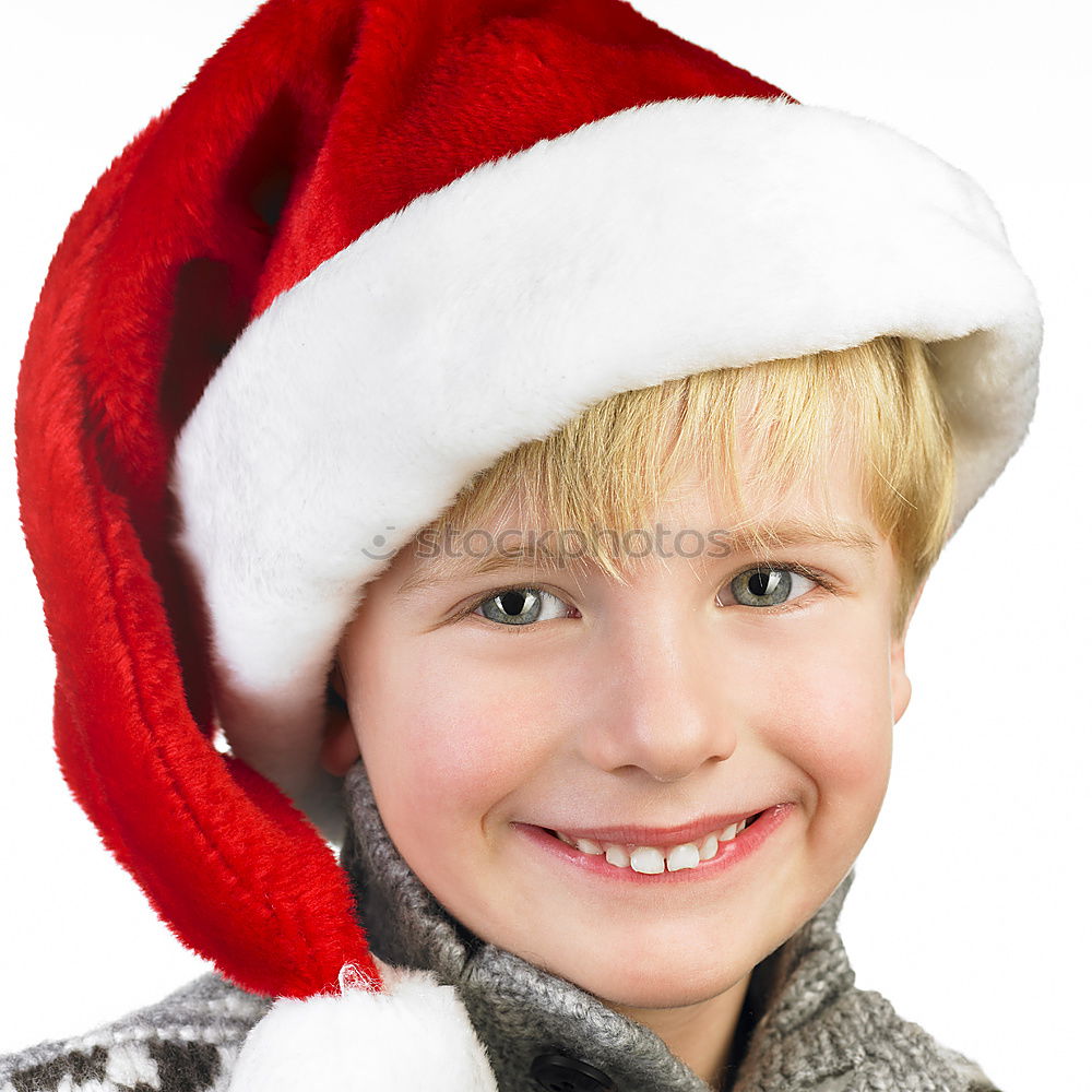 Similar – Image, Stock Photo Adorable kid with Santa´s hat on Christmas day.