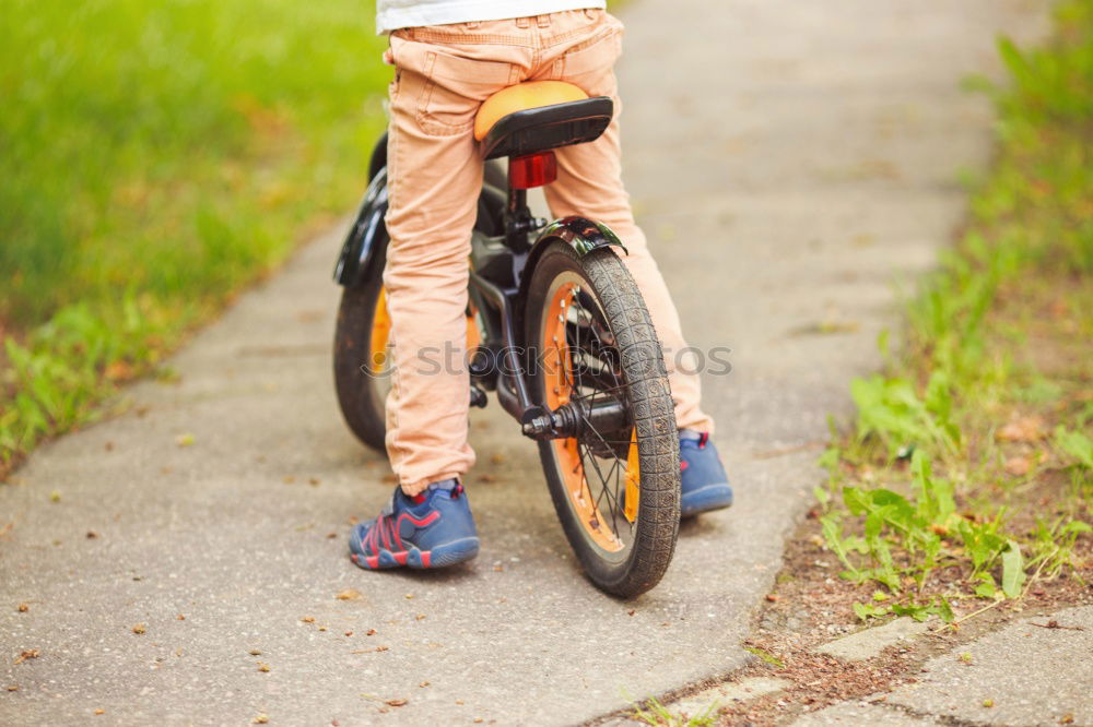 Similar – father and daughter fixing problems with bicycle outdoor