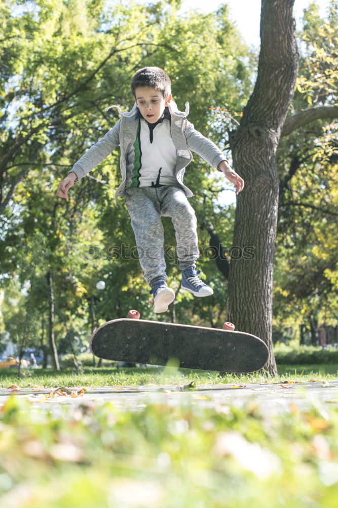 Similar – Boy with skateboard in the park