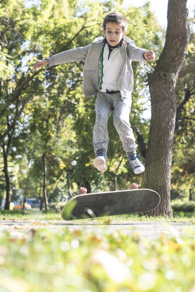 Boy with skateboard in the park