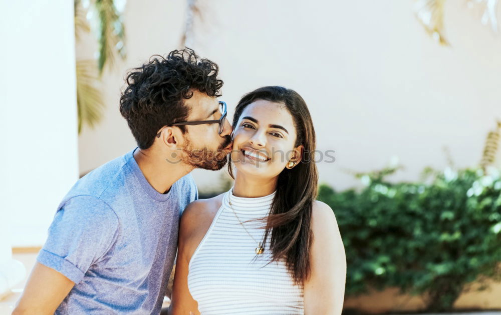 Couple standing at bus