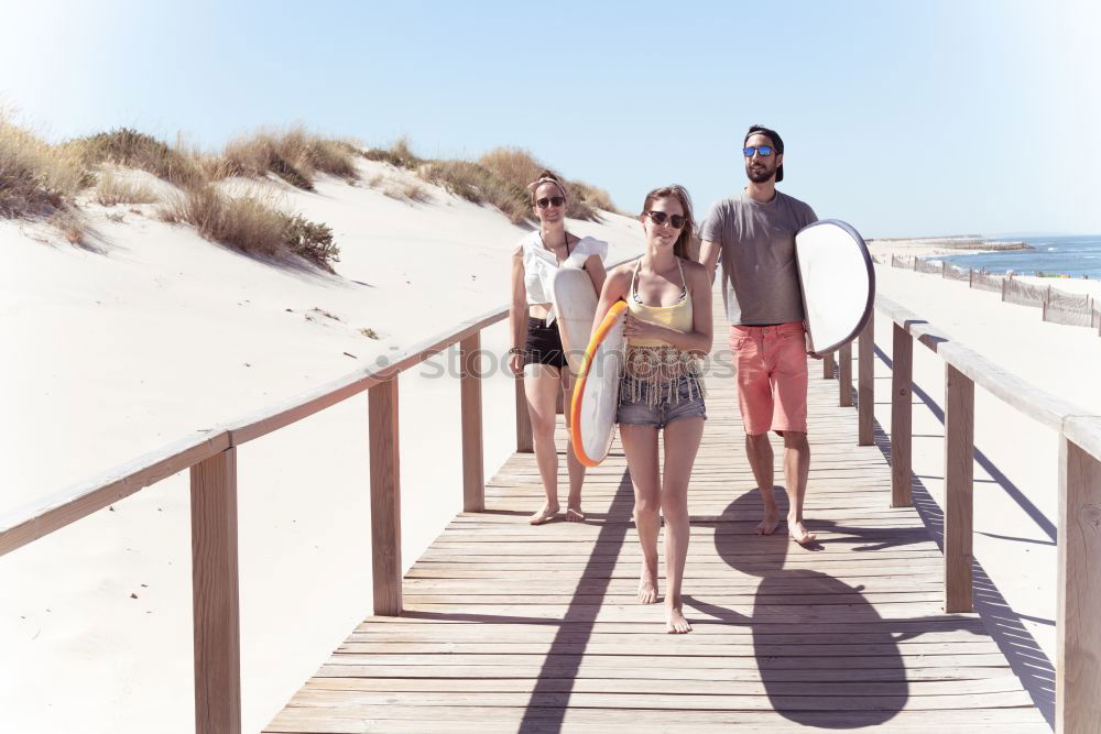 Similar – Image, Stock Photo Mother and son walking on the beach together