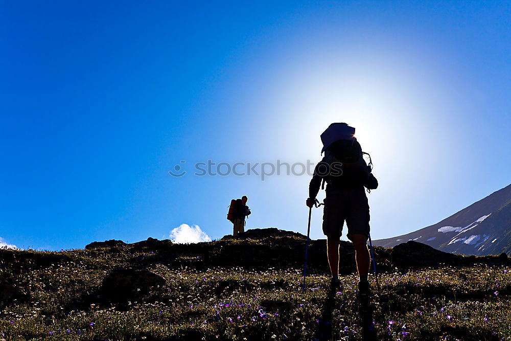 Similar – Silhouette of hiking friends