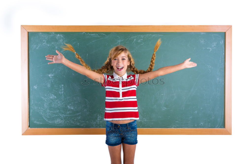 Similar – Pupil writing on the blackboard