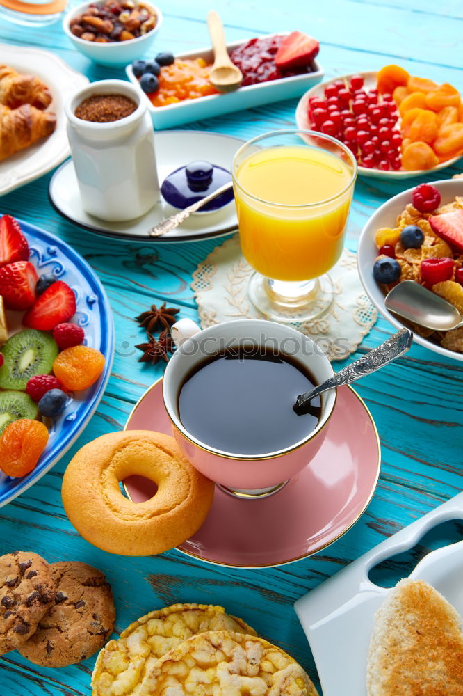 Similar – tea break with cups, flowers, cake and teapot