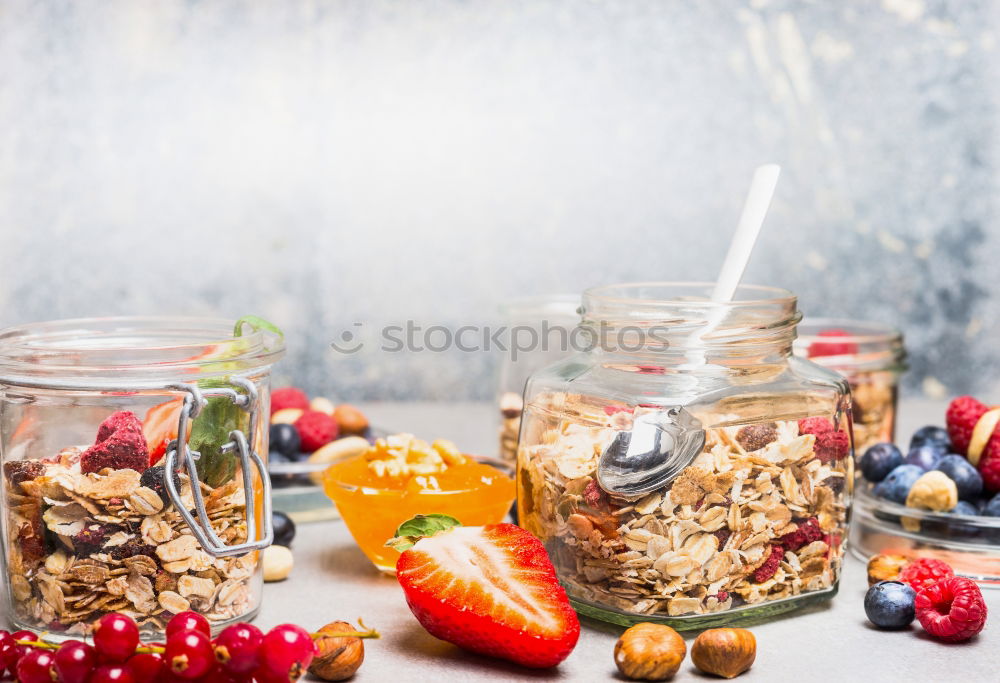 Similar – Image, Stock Photo Breakfast in glass with fresh berries, nuts and muesli