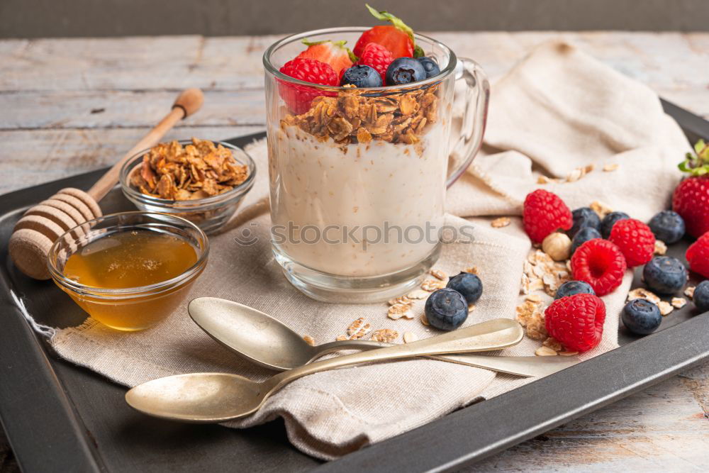 Similar – Chia yogurt with raspberries in a glass cup