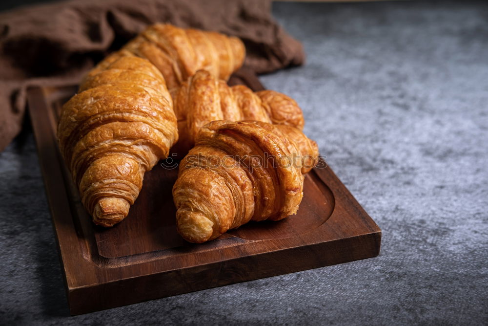 Similar – fresh bread and baked goods on wooden