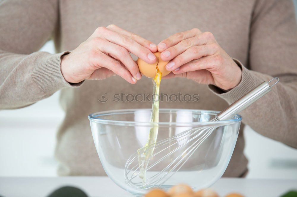 Similar – Image, Stock Photo Woman’s hands in sweater holding wooden bowl with grapes