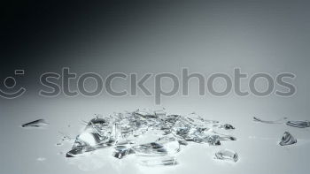 Similar – Half glass of water standing on the counter