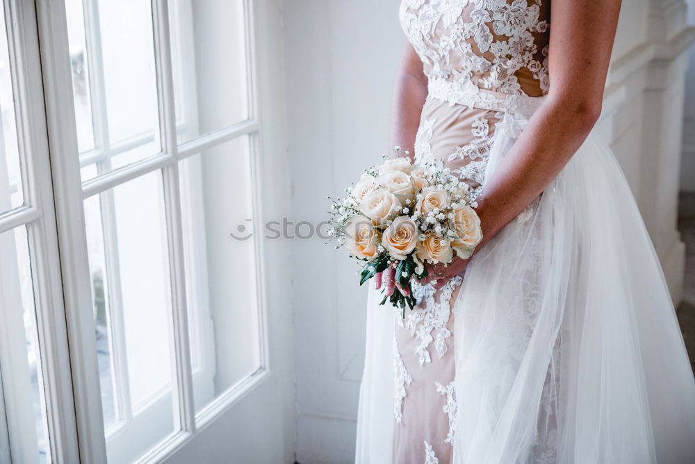 Back view of bride with bouquet