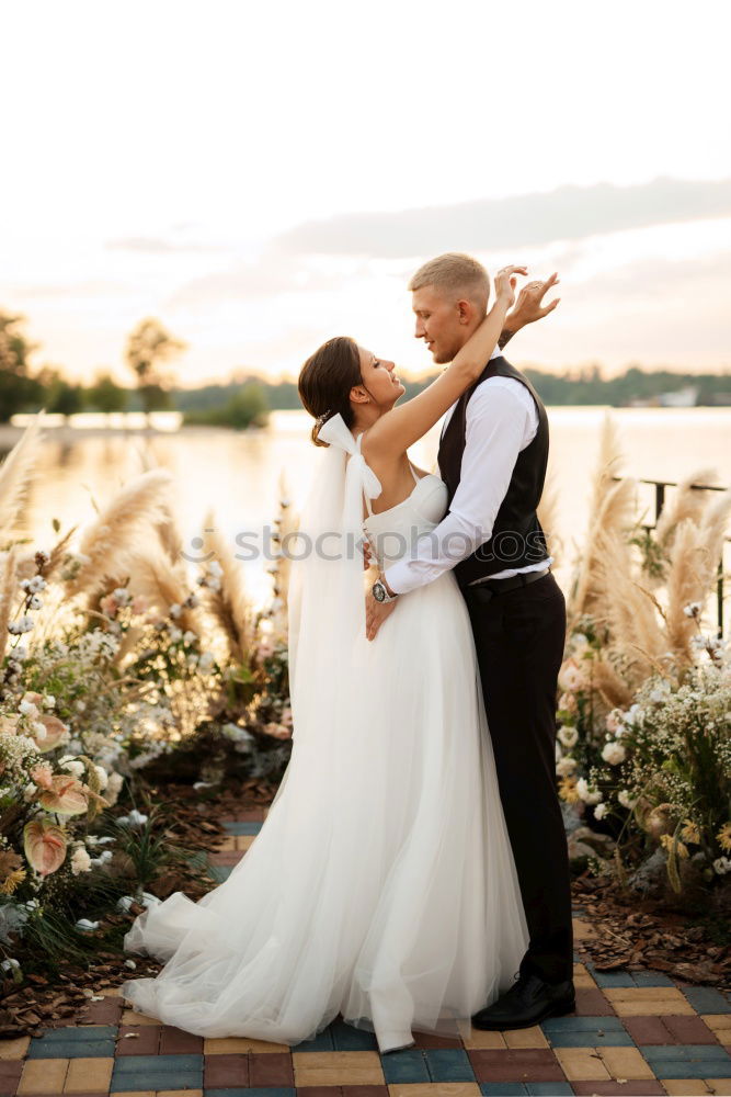 Similar – Newly married couple leaving the church.