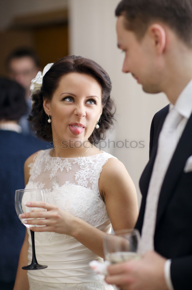 Image, Stock Photo Bride and groom enjoy a quiet moment together and a drink of white wine at their wedding reception