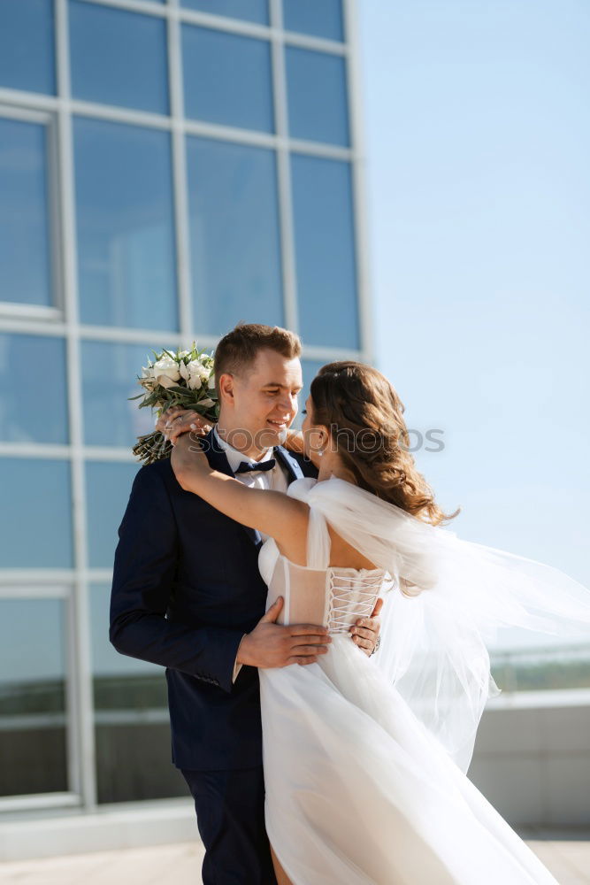 Similar – Newly married couple leaving the church.