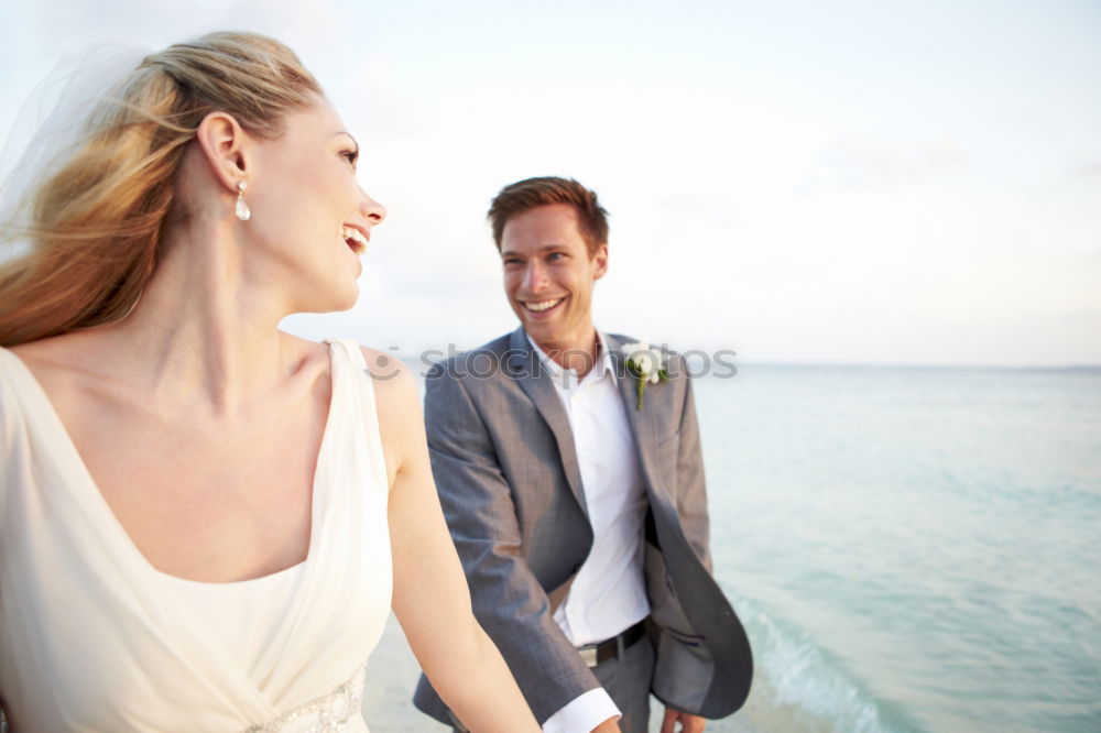 Similar – Image, Stock Photo Tender kissing bridal couple in sunlight