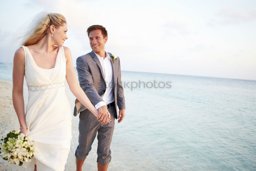 Similar – Image, Stock Photo Tender kissing bridal couple in sunlight