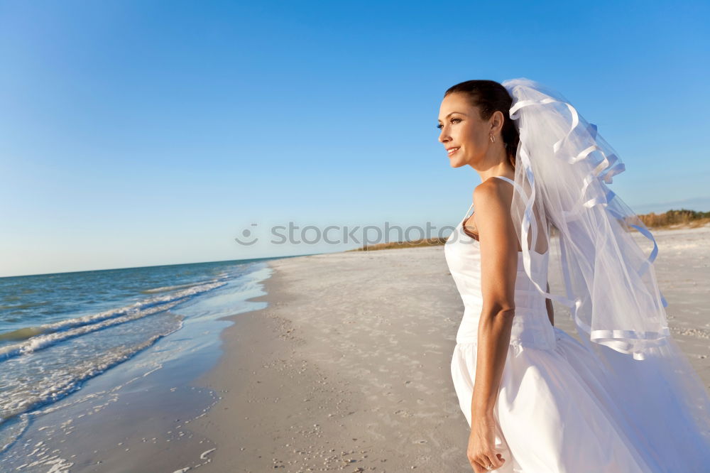 Similar – Image, Stock Photo Bride on the beach Wedding