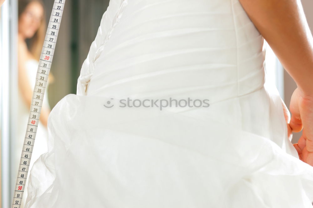 Similar – Image, Stock Photo Crop bride putting on shoes