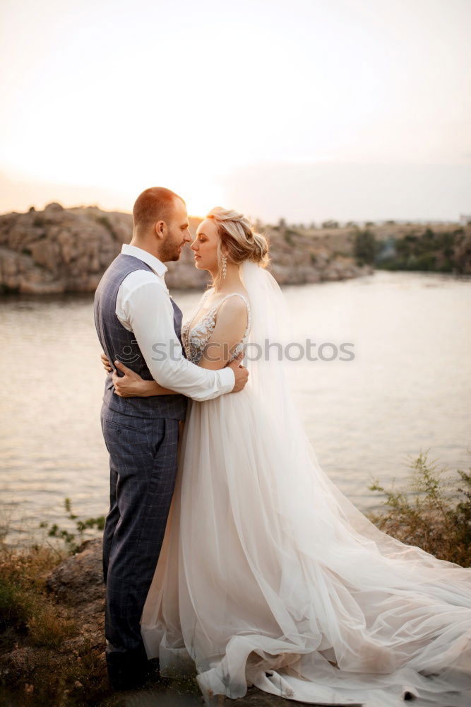 Image, Stock Photo Crop bride with bouquet embracing groom