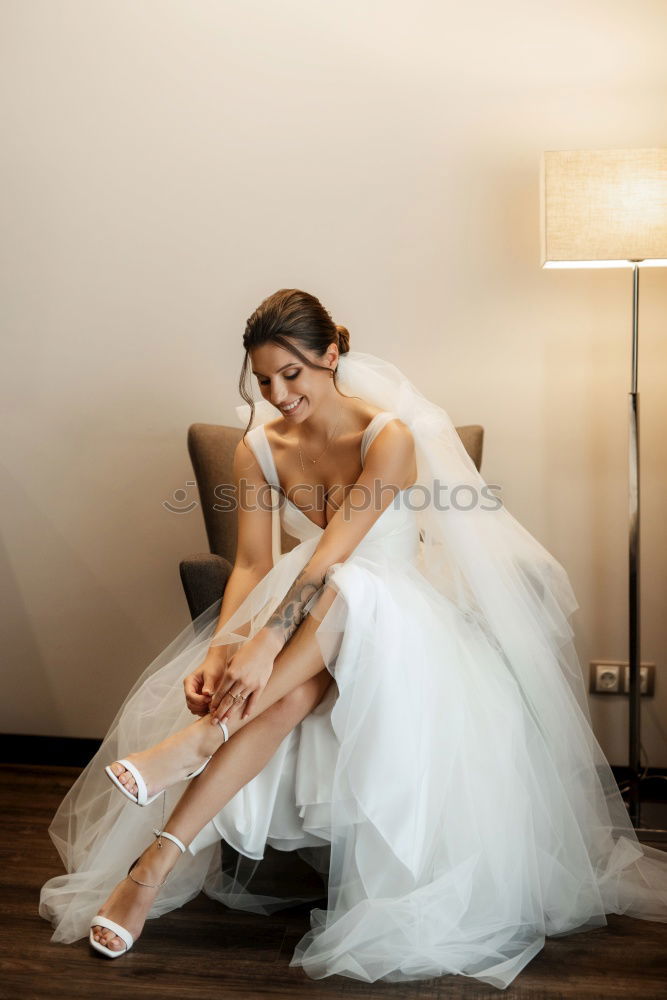 Similar – Image, Stock Photo Crop bride putting on shoes