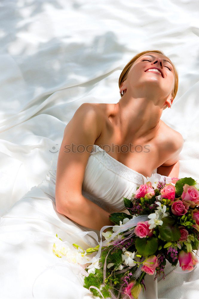 Similar – Woman lying in bathtub filled with flowers and fruits