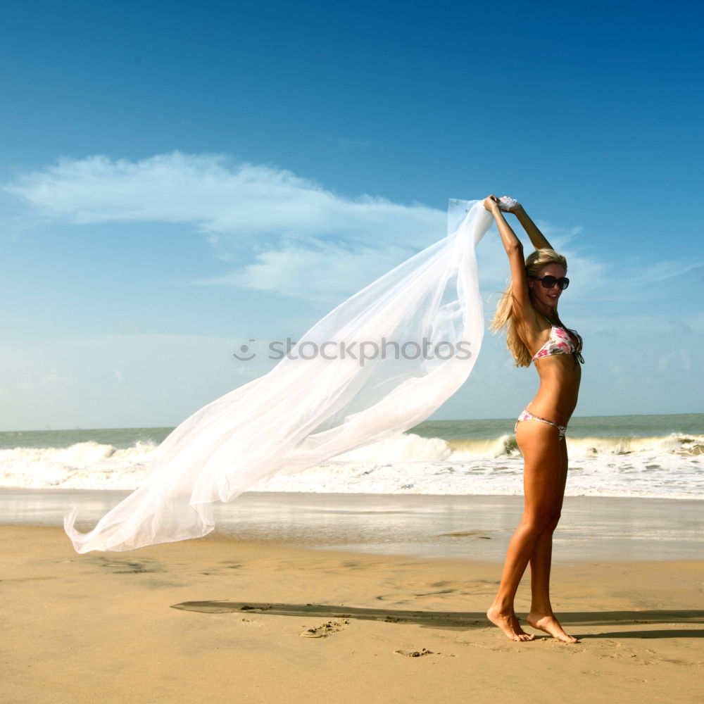 Similar – Image, Stock Photo Bride on the beach Wedding